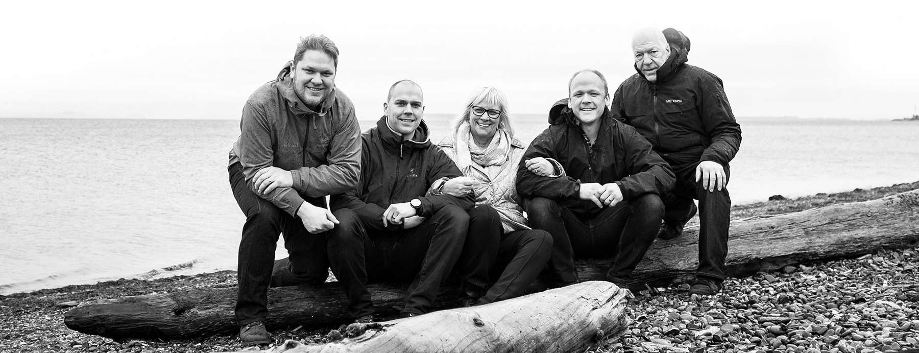 Wasmuth brothers, Andrew, James and Matthew, co-founders of PetKind, with their mum and Dad by the beach. 
